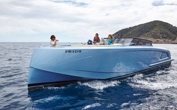 A family enjoying its Vanquish Yacht in Ibiza