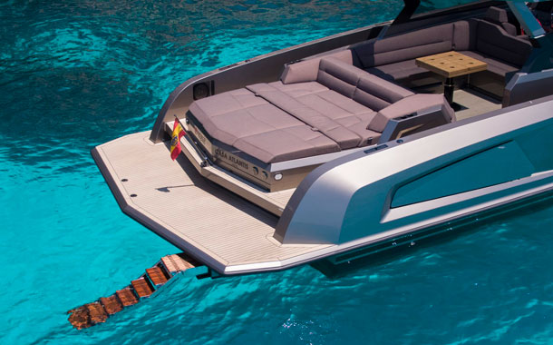 A family enjoying its Vanquish Yacht in Ibiza